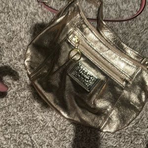 Gold coach shoulder bag